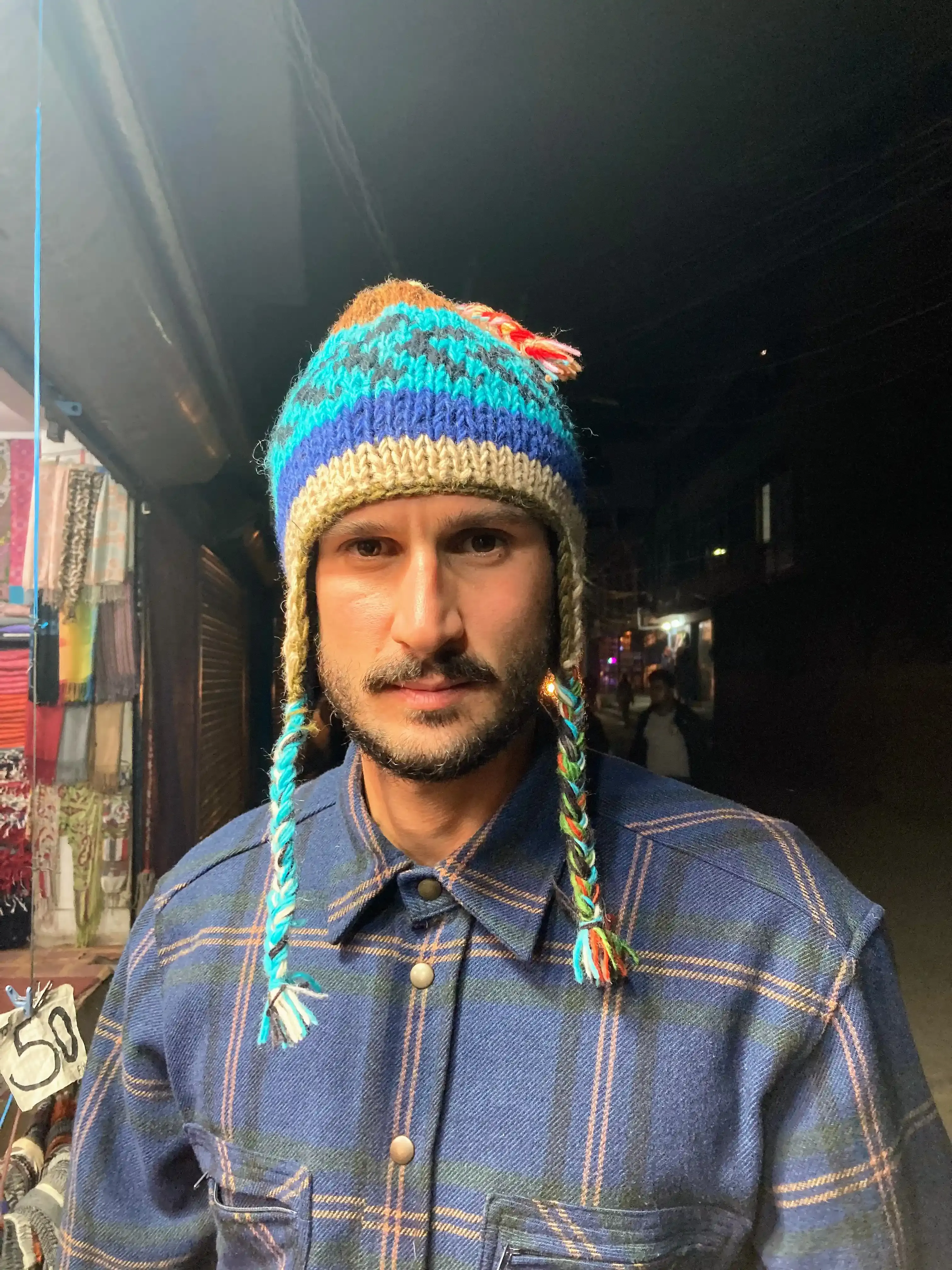 Lele buying a wool hat in Thamel