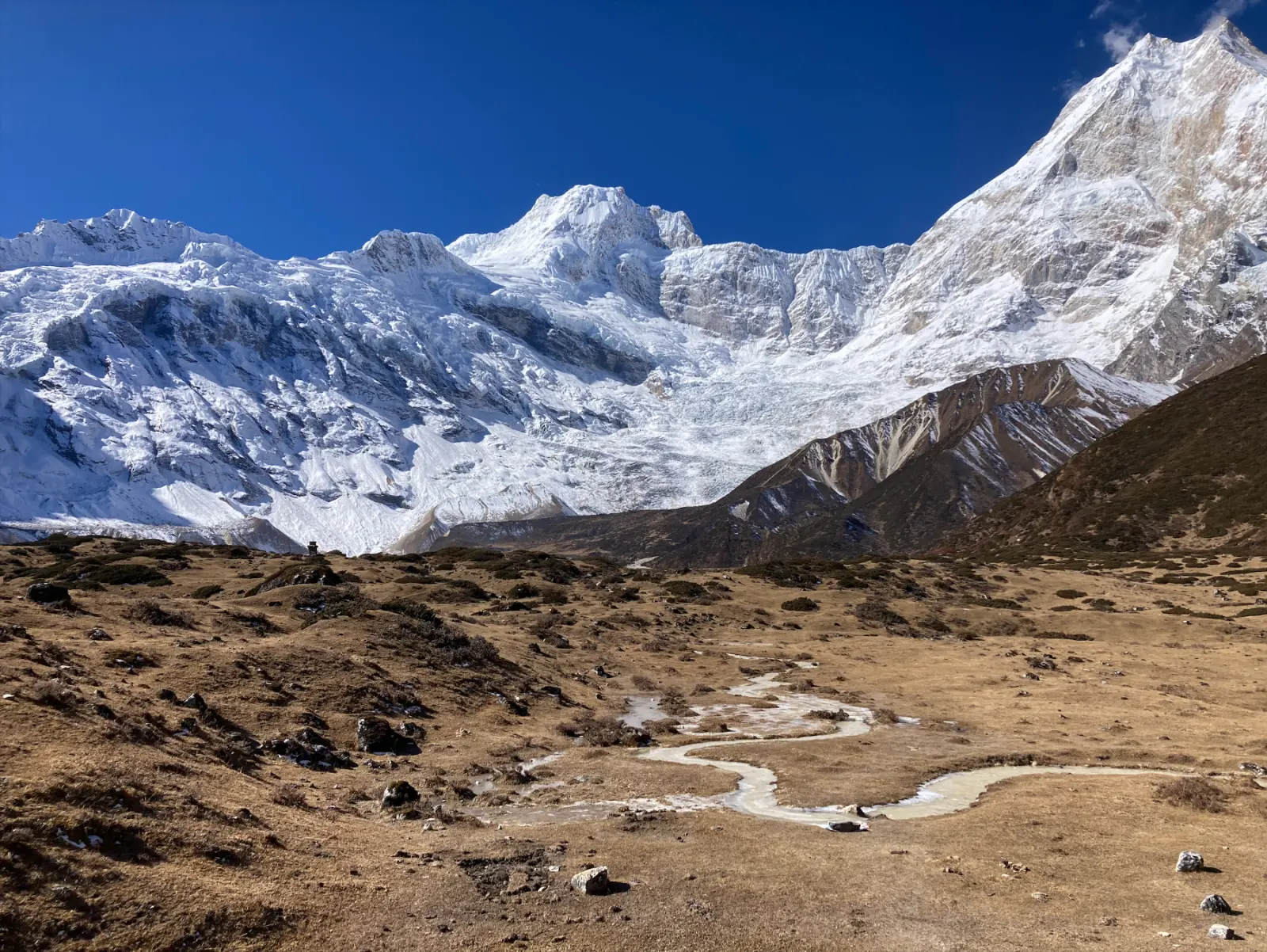 View of the Manaslu and the snowy mountains aroud it