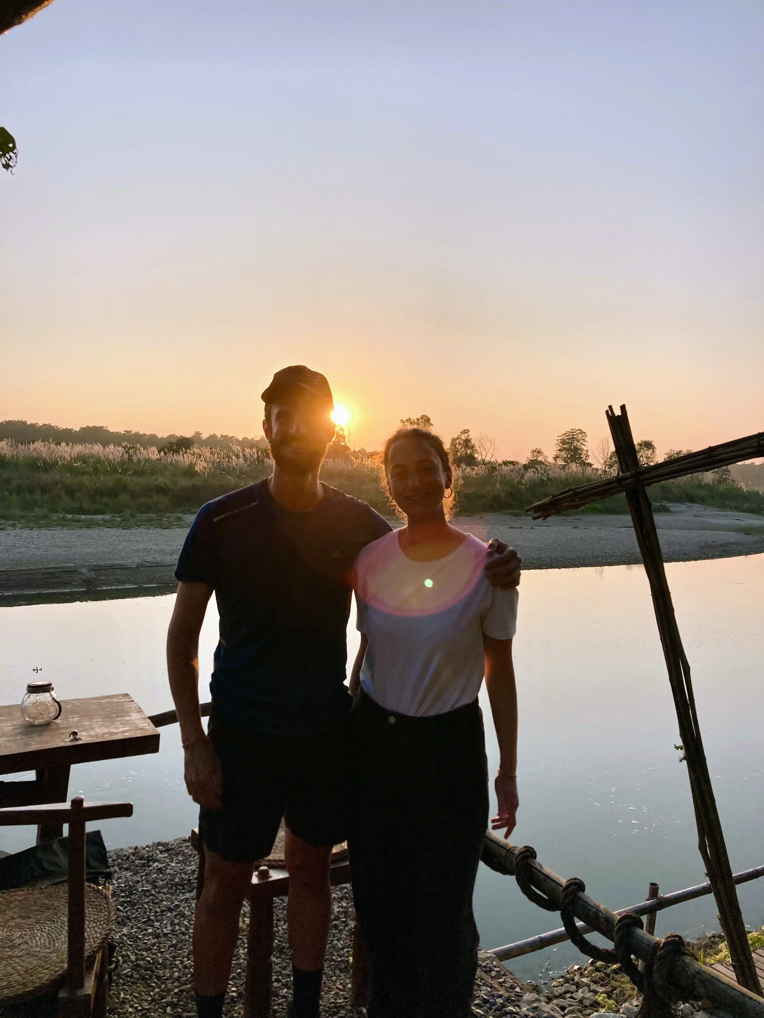 Sofi & Lele in front of the river at sunset